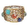 Antique gold colour metal cut out botanical pattern cuff bangle embellished with multi-colour stones