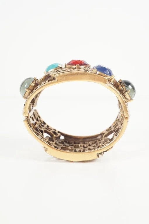 Antique gold colour metal cut out botanical pattern cuff bangle embellished with multi-colour stones