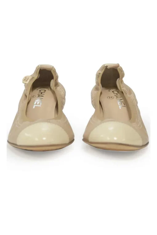 Beige and ivory lambskin low-heel Spirit pumps with contrast cap toe