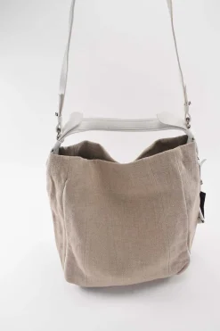 Beige cloth with white leather shoulder strap tote bag