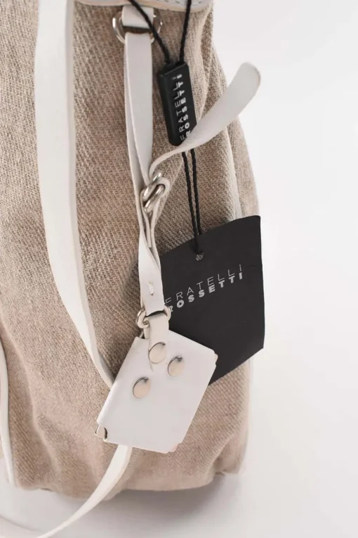Beige cloth with white leather shoulder strap tote bag