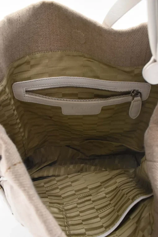 Beige cloth with white leather shoulder strap tote bag