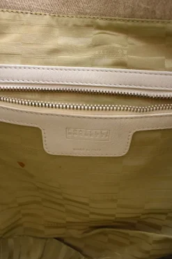 Beige cloth with white leather shoulder strap tote bag