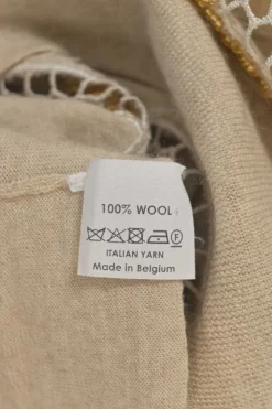 Beige embellished wool jersey knit crewneck pullover sweater featuring bead broderie and cutout edge trim appliqué