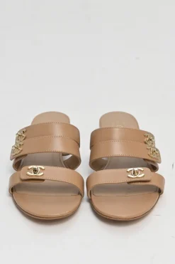Beige leather Coco Mark turnlock strap slide sandals