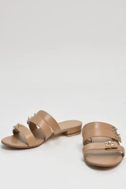 Beige leather Coco Mark turnlock strap slide sandals