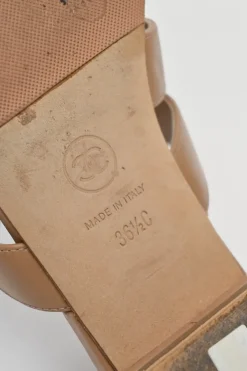 Beige leather Coco Mark turnlock strap slide sandals