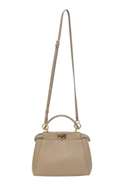 Beige leather Peekaboo satchel with gold-tone metallic hardware and adjustable shoulder strap