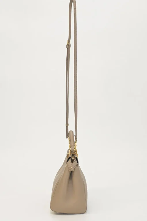 Beige leather Peekaboo satchel with gold-tone metallic hardware and adjustable shoulder strap