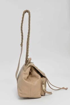 Beige studded leather convertible backpack with zip straps