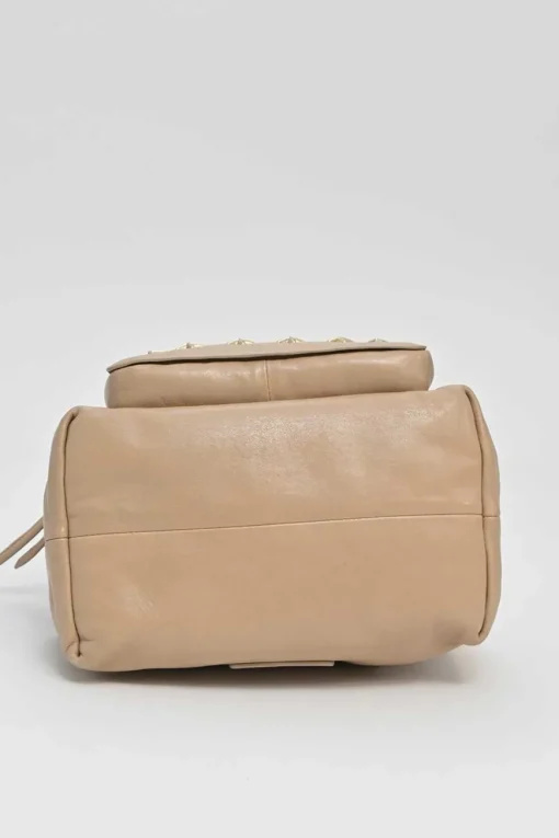 Beige studded leather convertible backpack with zip straps
