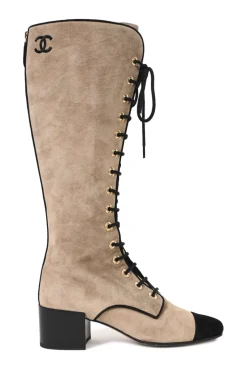 Beige suede lace-up tall boots with contrasting cap toe