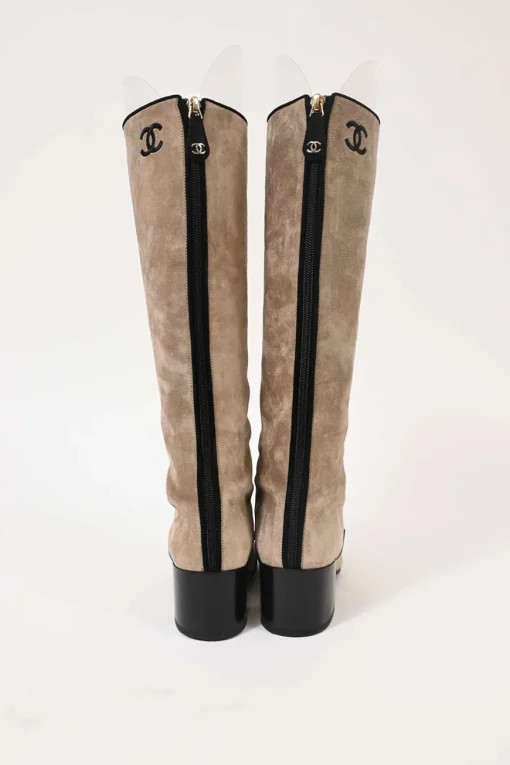 Beige suede lace-up tall boots with contrasting cap toe