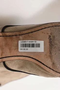 Beige suede lace-up tall boots with contrasting cap toe