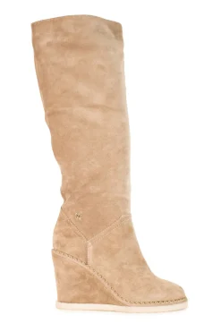 Beige suede lug-sole pull-on knee-high wedge boots with gold-tone metallic chain trim