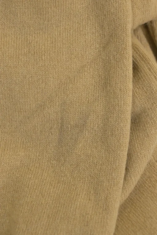 Beige wool button-front cardigan featuring signature chest heart broderie motif