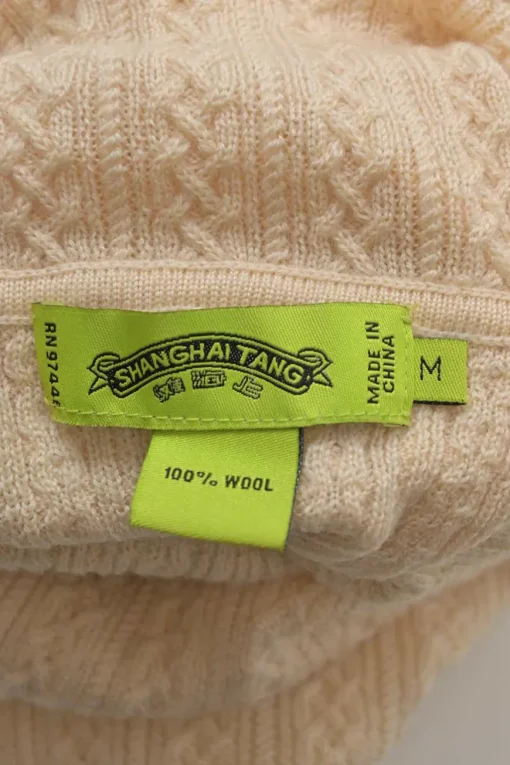 Beige wool interlock cable knit  roll neck pullover sweater with button loop collar closure