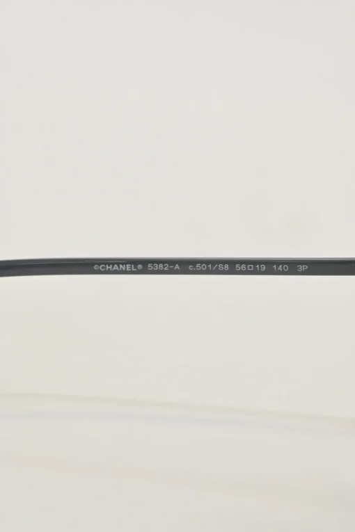 Black acetate and polarised polycarbonate round sunglasses with gold-tone metallic hardware