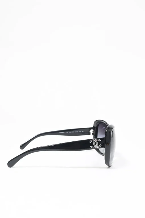 Black acetate and tinted polycarbonate oversized sunglasses with silver-finish Coco Mark motif at temples
