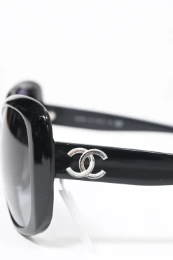 Black acetate and tinted polycarbonate oversized sunglasses with silver-finish Coco Mark motif at temples