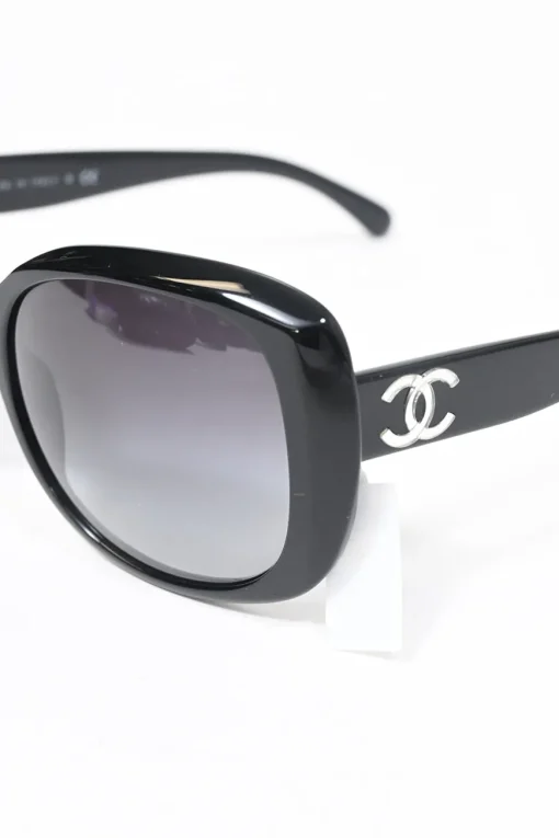 Black acetate and tinted polycarbonate oversized sunglasses with silver-finish Coco Mark motif at temples