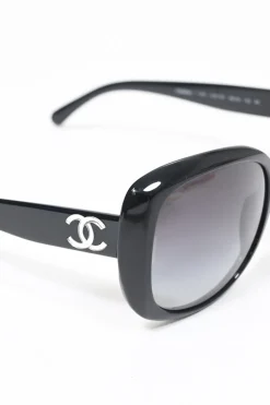 Black acetate and tinted polycarbonate oversized sunglasses with silver-finish Coco Mark motif at temples