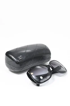 Black acetate and tinted polycarbonate oversized sunglasses with silver-finish Coco Mark motif at temples