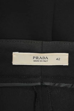 Black acetate-blend low-rise pleat-front tapered leg tailored trousers