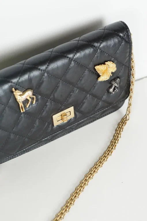 Black aged calfskin 2.55 wallet on chain with deer, leave and mushroom pins