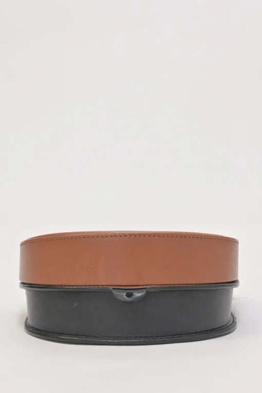 Black and brown leather Heel Duo anagram-embossed shoulder flap bag with adjustable shoulder strap