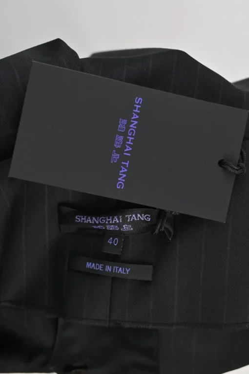 Black and brown wool tailored trousers with contrasting moiré belt