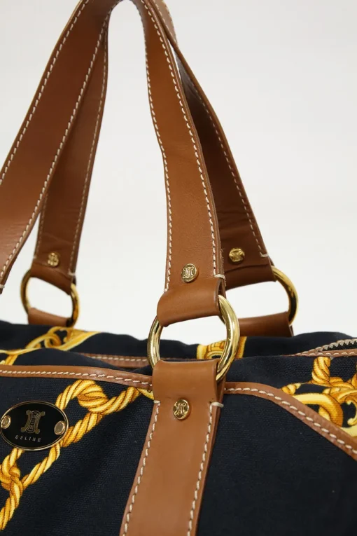 Black and camel leather-trimmed chainlink-print canvas boston bag with gold-tone hardware