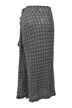 Black and charcoal woolcrochet knit shawl collar robe jacket, apron-style handkerchief skirt and shoulder bag three-piece set