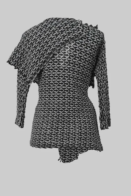 Black and charcoal woolcrochet knit shawl collar robe jacket, apron-style handkerchief skirt and shoulder bag three-piece set