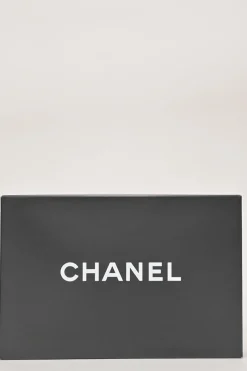 Black and copper aged matelassé leather CC chain wristlet clutch
