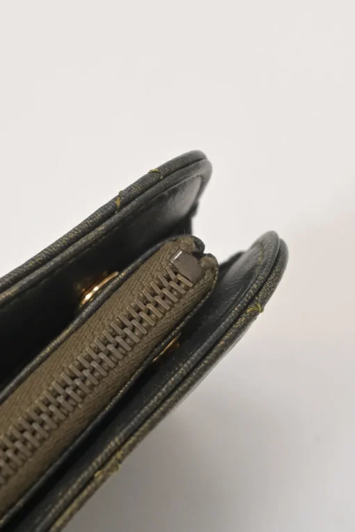 Black and copper aged matelassé leather CC chain wristlet clutch