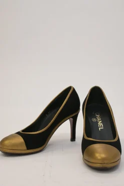 Black and copper suede and leather round-toe platform pumps with contrast cap toe and metallic Coco Mark heel appliqué
