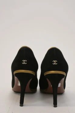 Black and copper suede and leather round-toe platform pumps with contrast cap toe and metallic Coco Mark heel appliqué