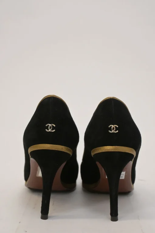 Black and copper suede and leather round-toe platform pumps with contrast cap toe and metallic Coco Mark heel appliqué