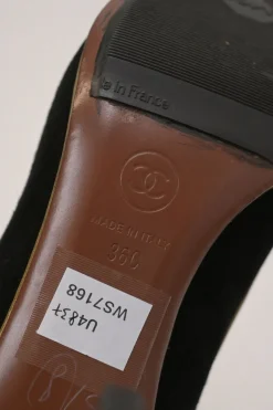 Black and copper suede and leather round-toe platform pumps with contrast cap toe and metallic Coco Mark heel appliqué