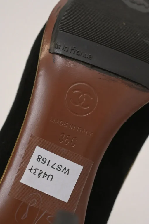 Black and copper suede and leather round-toe platform pumps with contrast cap toe and metallic Coco Mark heel appliqué