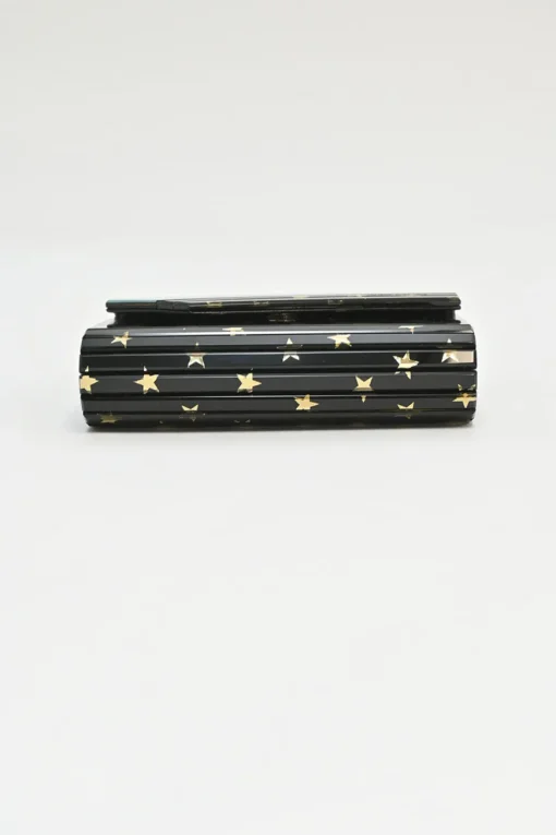 Black and gold acrylic Candy Star clutch with metallic chain strap