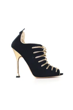 Black and gold peep-toe high-heel bootie exaggerated scalloped cage detail