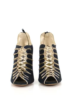 Black and gold peep-toe high-heel bootie exaggerated scalloped cage detail