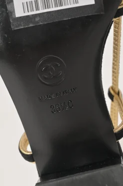 Black and gold suede and foiled lambskin slingback sandals featuring Coco Mark block heel plaque