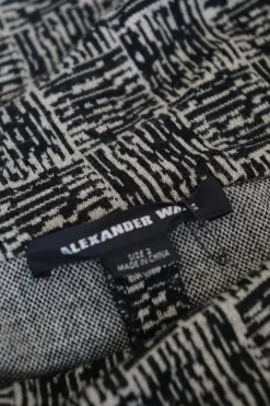 Black and grey wool-blend off-shoulder woven look jacquard knit cycling style onesie