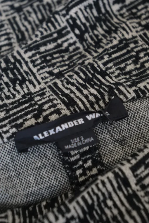 Black and grey wool-blend off-shoulder woven look jacquard knit cycling style onesie