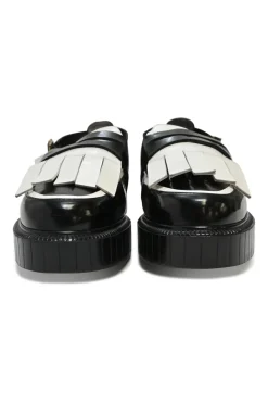 Black and ivory polished calfskin creeper-style cutout penny loafers