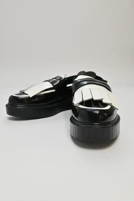 Black and ivory polished calfskin creeper-style cutout penny loafers