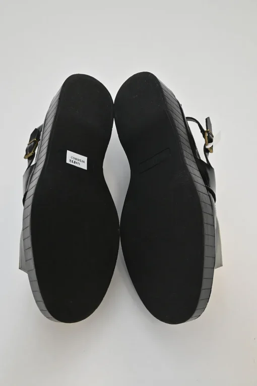 Black and ivory polished calfskin creeper-style cutout penny loafers